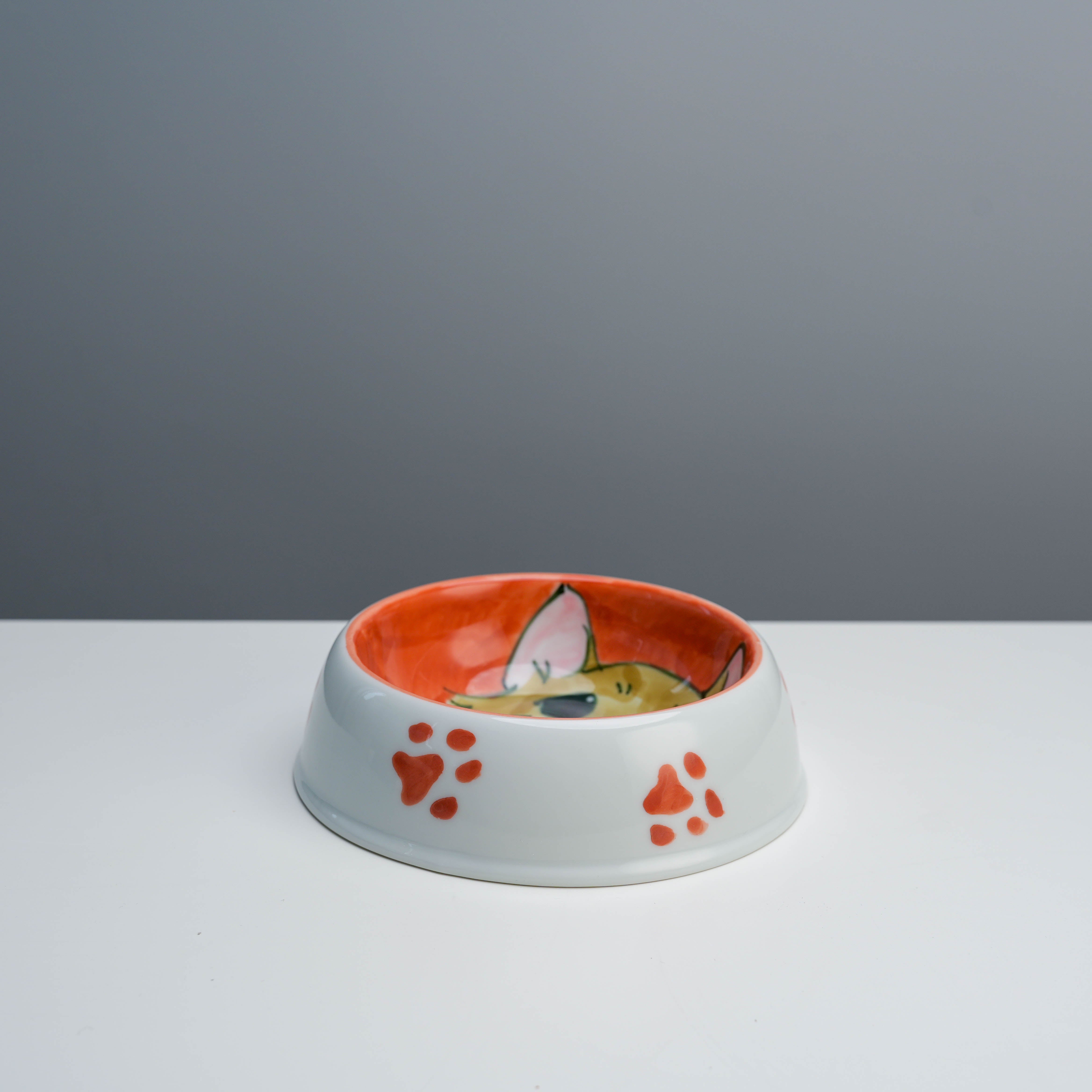Paw-printed dog face pet dish