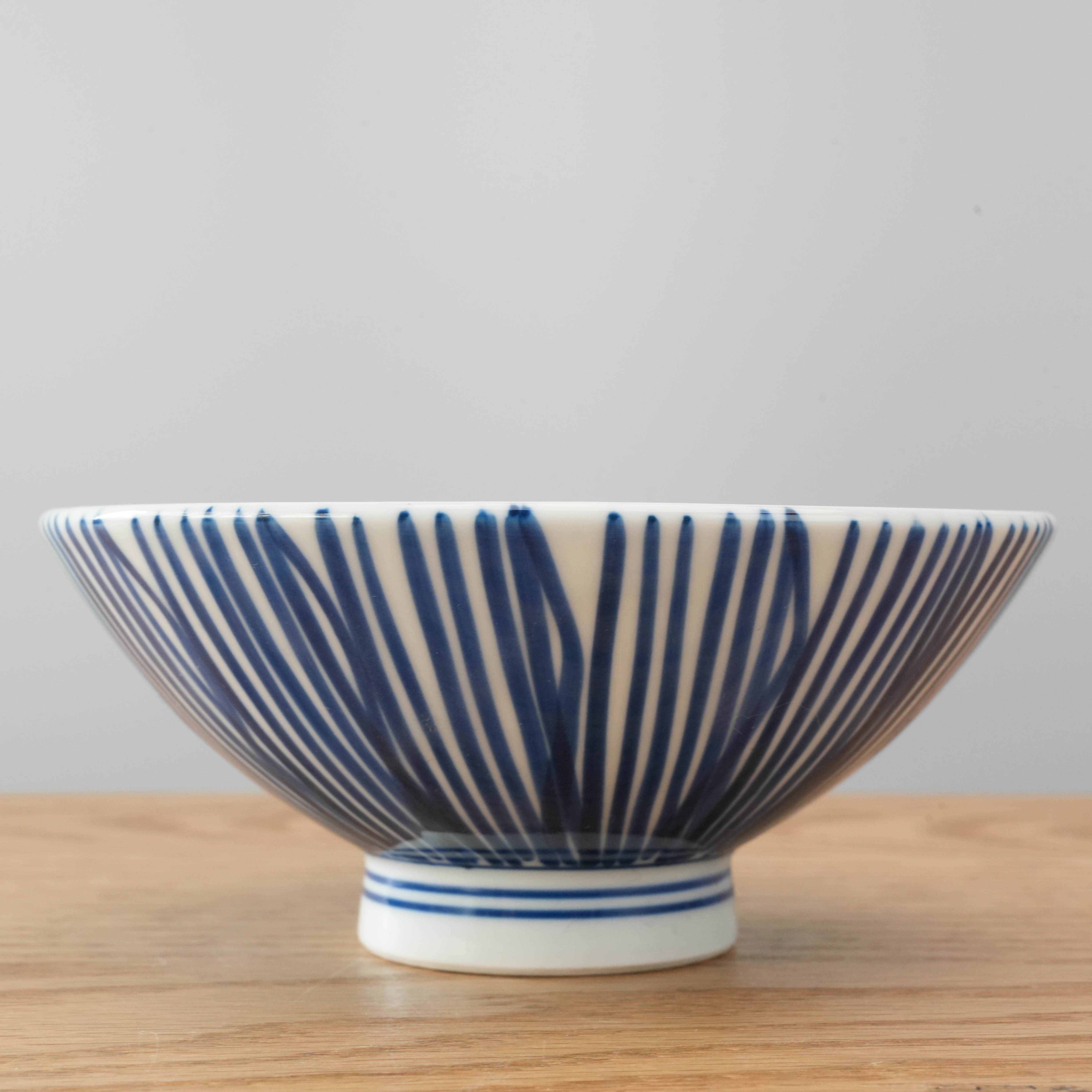 Flared bowl with striped pattern