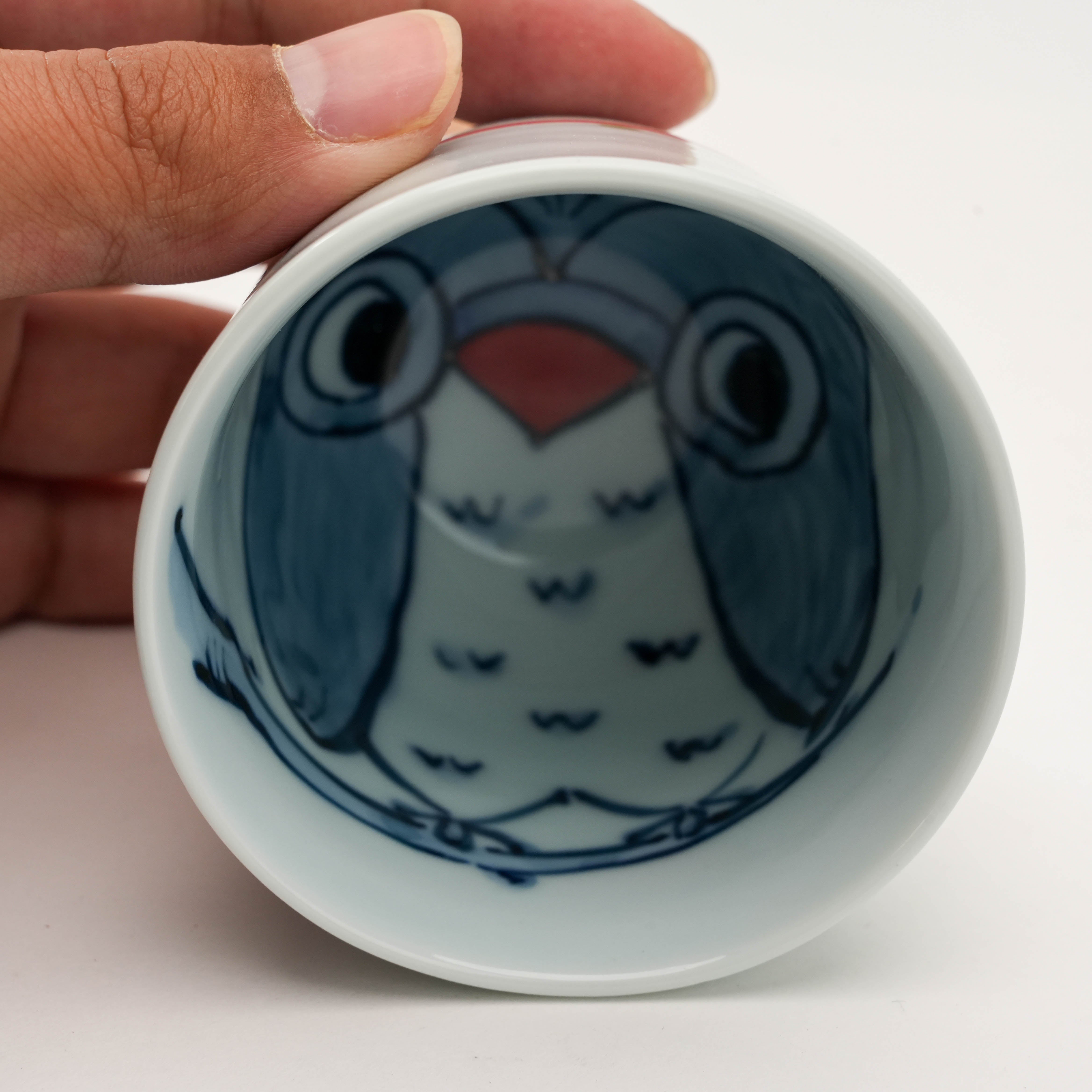 Owl-decorated drinking cups