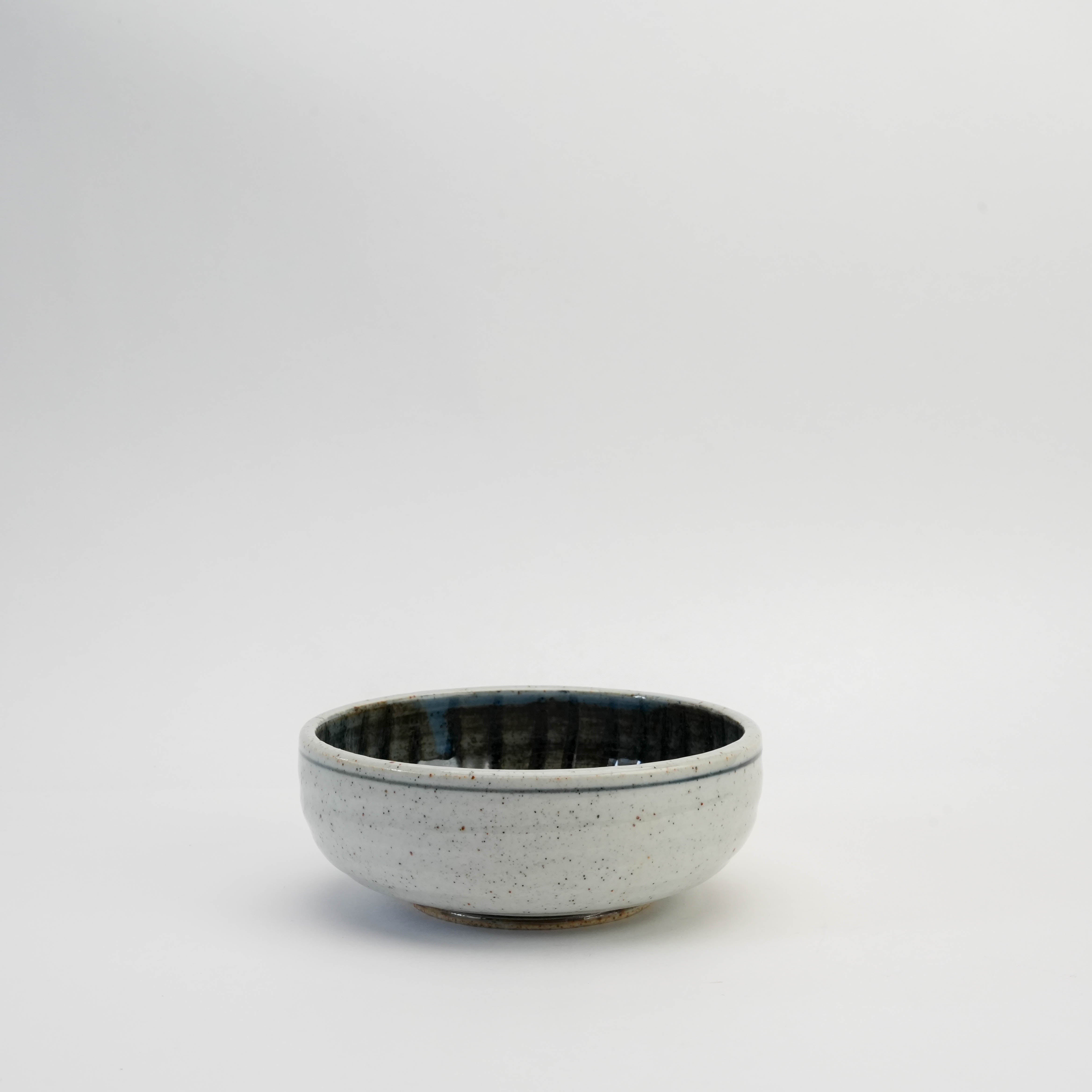 Radial-patterned shallow bowl